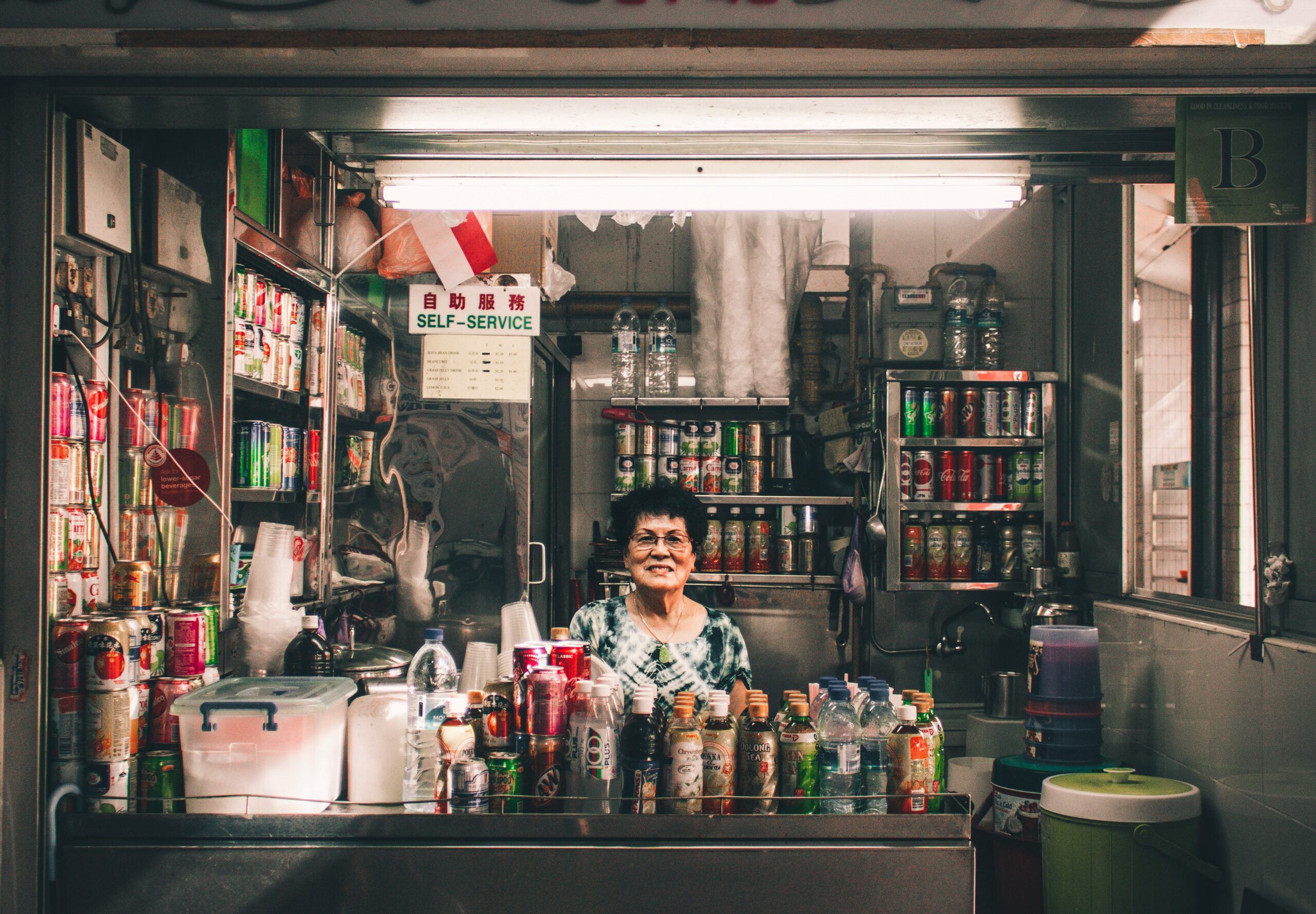 woman sitting in front of label container lot